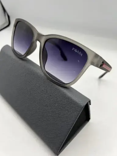 GAFAS PRADA GRIS